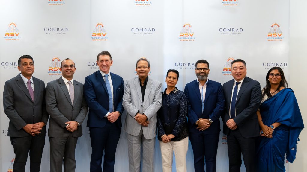 Third from the left - Alan Watts, President, Asia Pacific, Hilton and Fifth from the right - Rajendra Mundra, Managing Director, SunnyRaj Properties Pvt Ltd