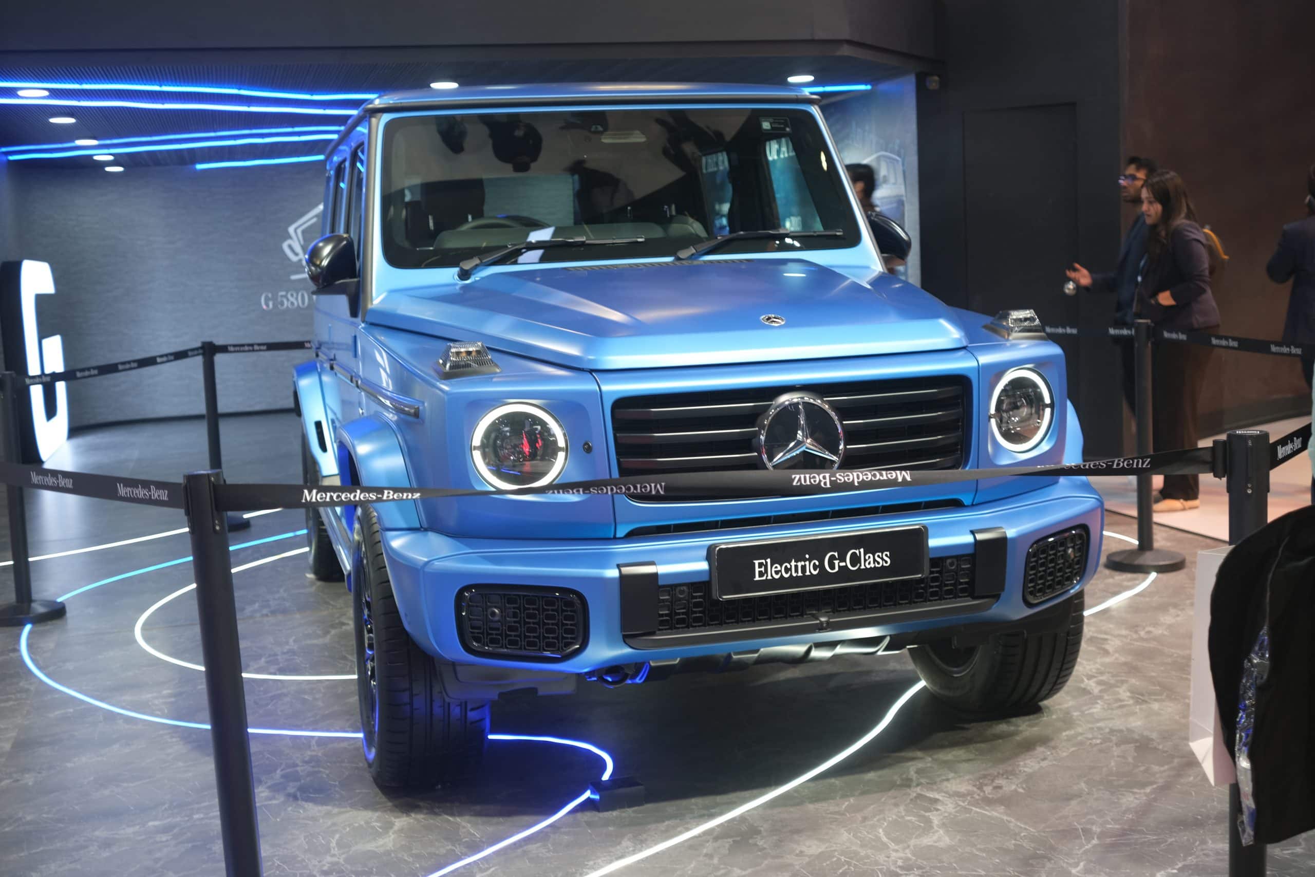 The G 580's black grille with animated LED strip marks its electric identity, auto expo