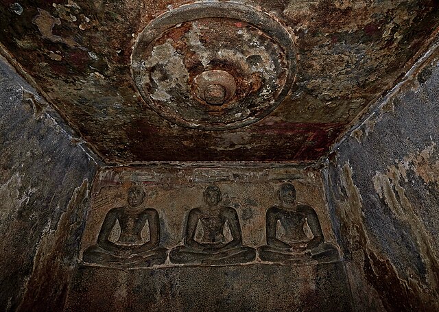 Sittanavasal Cave (also, Arivar Koil) a 2nd-century Jain complex of caves in Sittanavasal village in Tamil Nadu, India. The monument is a rock-cut monastery or temple. Created by Jains, it contains remnants of notable 7th-century frescoes with murals painted with vegetable and mineral dyes in black, green, yellow, orange, blue, and white. Image courtesy: R.K.Lakshmi via Wikimedia Commons