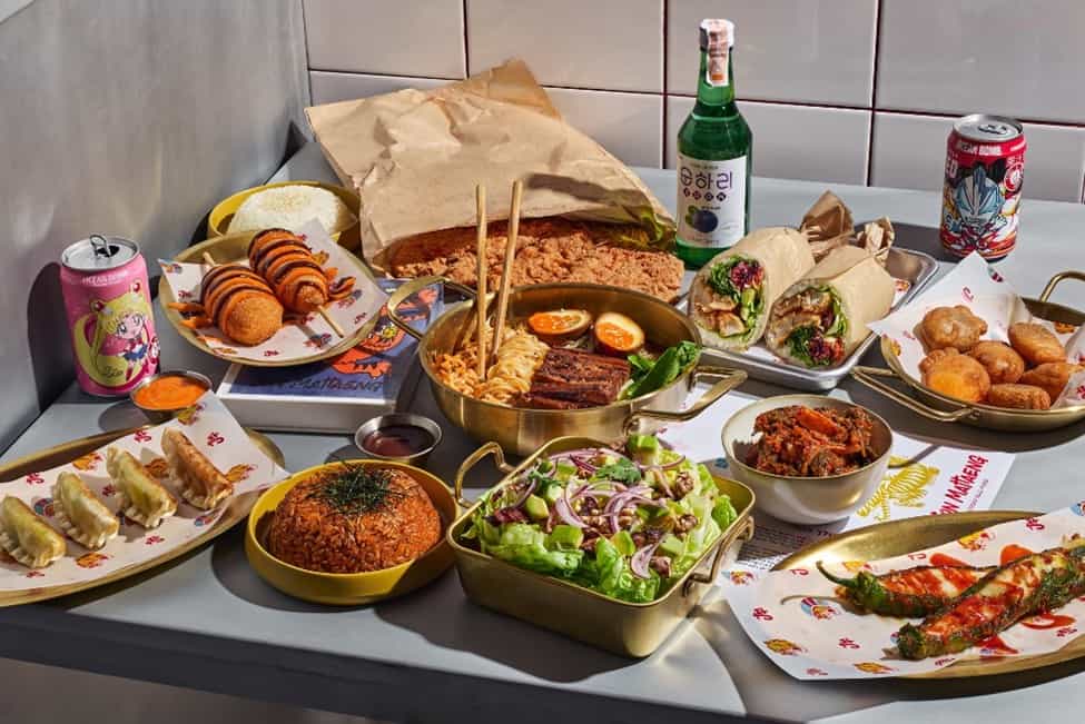 Restaurants in Tel Aviv: Dishes at JMT include Gimari ; Creamy Tteokbokki ; Pajeon; Korean Wings; Dwaeji Pai and Handmade Kimchi. Image courtesy: Amir Menachem 